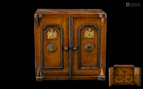 Early 20thC Novelty Oak Tea Caddy In The Form Of A Two Door Safe, The Interior With 1 Long Over