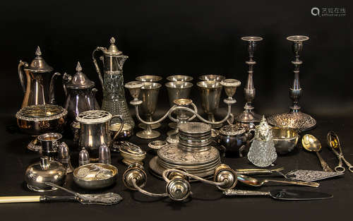 A Large Collection of Silver Plate to include candlesticks, goblets, condiments, place settings etc.