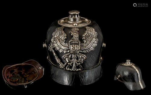 WWI German Pickelhaube with winged eagle motif inscribed 'Mit Gott Fúr Koenig Und Vaterland'