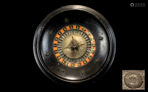 Roulette Wheel. Mid to early 20th Century Roulette wheel, Constructed of heavy dark wood with