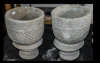 Two Mayan Urns - circular planter decorated with Aztec design on circular base.