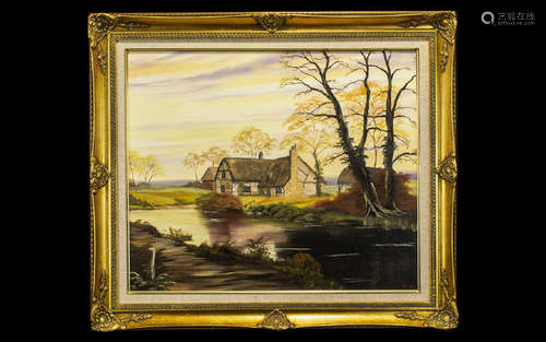 Large Oil Painting in Ornate Gilt Frame depicting a cottage on a river with trees in the background.