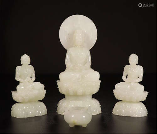 THREE CHINESE YELLOW JADE SEATED BUDDHA