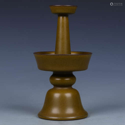 A Chinese Tea-Dust Glazed Porcelain Candle Holder