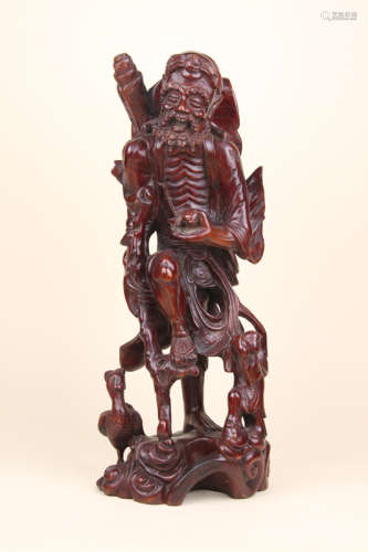 A Chinese Carved Hardwood Figure