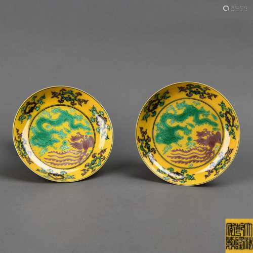 A Pair of Chinese Yellow Ground San-Cai Glazed Porcelain Plates