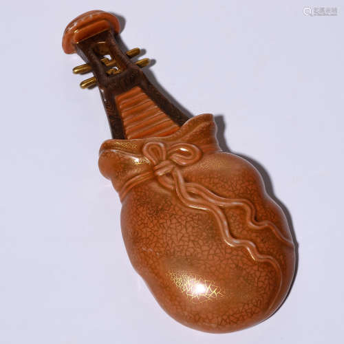 A Chinese Red Glazed Porcelain Instrument