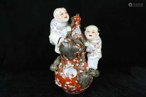 A Chinese Famille-Rose Porcelain Figure of Boys