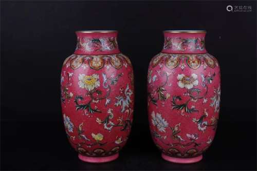A Pair of Chinese Red Ground Famille-Rose Porcelain Vases