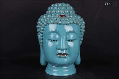 A Chinese Turquoise-Green Glazed Porcelain Buddha Head