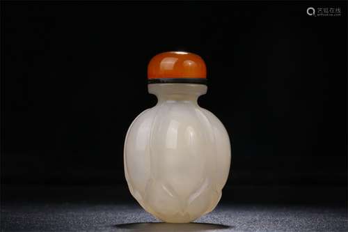 A Chinese Carved Jade Snuff Bottle