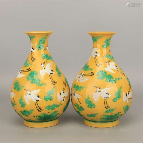 A Pair of Chinese Yellow Ground San-Cai Glazed Porcelain Vases