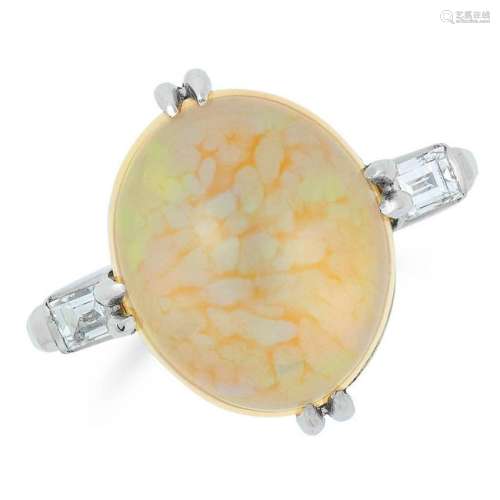 OPAL AND DIAMOND RING set with a cabochon opal between