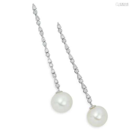 PEARL AND DIAMOND EARRINGS each comprising of a line of