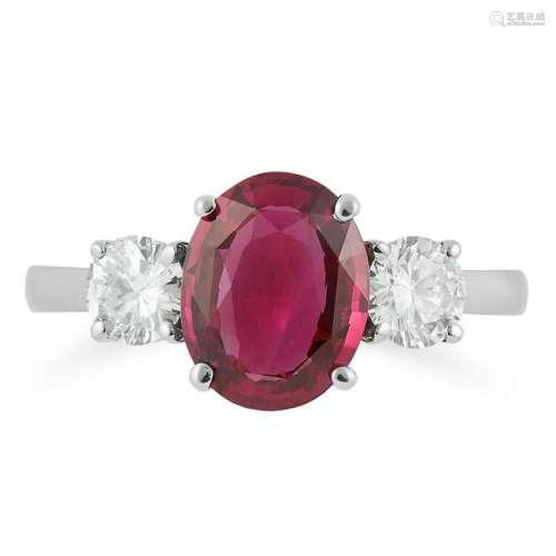 THAI RUBY AND DIAMOND THREE STONE RING set with an oval