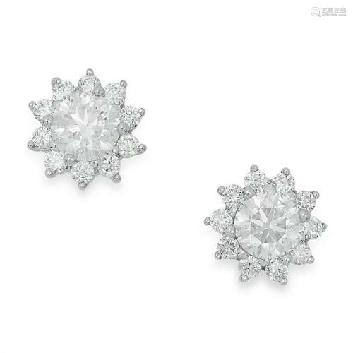 0.98 CARAT DIAMOND STUD EARRINGS each set with a