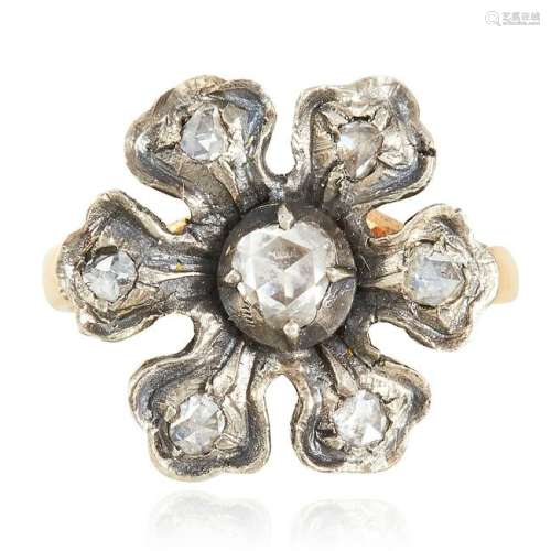 A DIAMOND RING depicting a flower set with rose cut