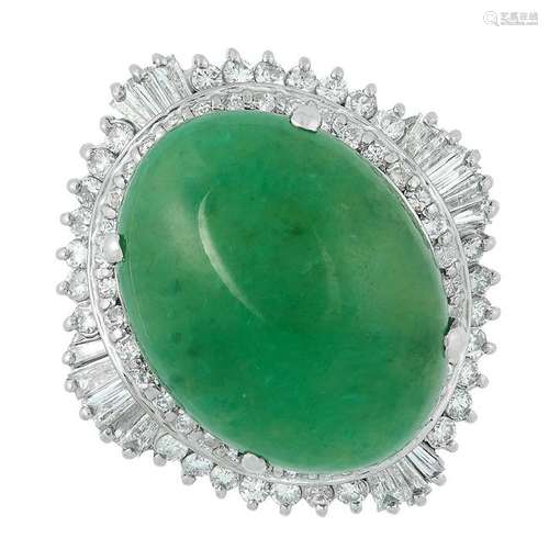 A JADEITE JADE AND DIAMOND RING set with an oval