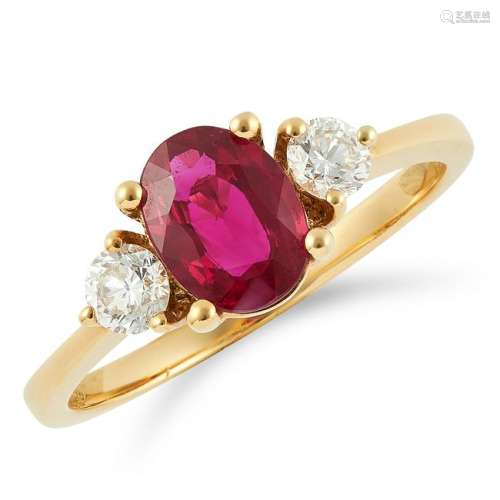 RUBY AND DIAMOND THREE STONE RING set with an oval cut