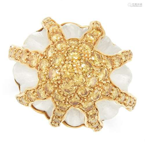 A YELLOW DIAMOND AND ROCK CRYSTAL RING designed as a