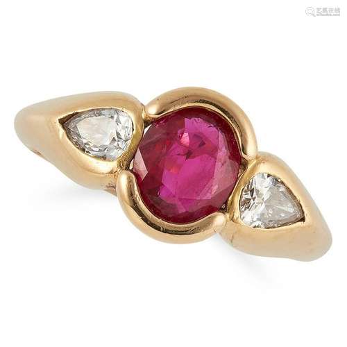 RUBY AND DIAMOND RING set with an oval cut ruby between