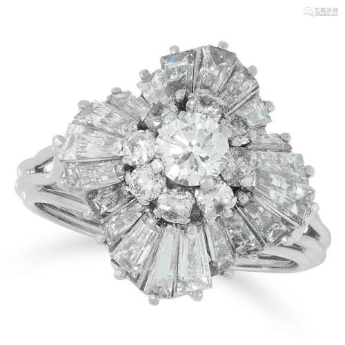 A DIAMOND BALLERINA RING set with tapered baguette and