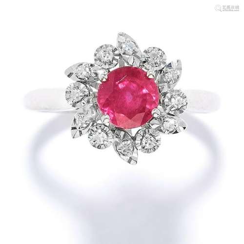 RUBY AND DIAMOND CLUSTER RING set with a round cut ruby