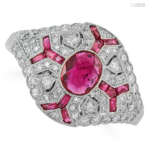 RUBY AND DIAMOND DRESS RING set with an oval cut ruby,