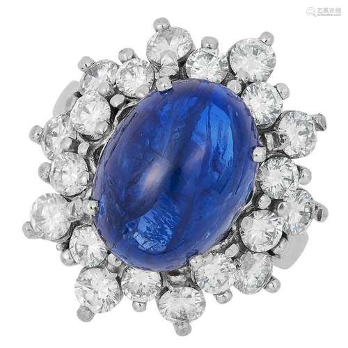 A BURMA NO HEAT CABOCHON SAPPHIRE AND DIAMOND CLUSTER