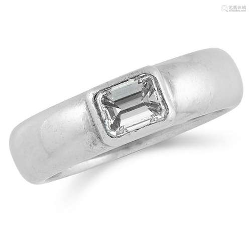 DIAMOND DRESS RING set with an emerald cut diamond,