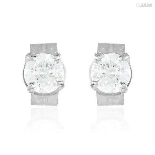 A PAIR OF 0.51 CARAT DIAMOND EAR STUDS each set with a