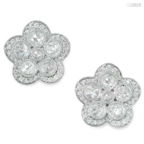 A PAIR OF DIAMOND FLOWER EARRINGS set with round and