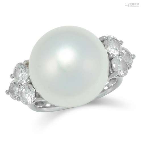 A CULTURED PEARL AND DIAMOND RING set with a pearl of