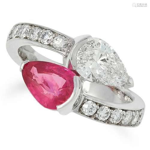 A RUBY AND DIAMOND TOI ET MOI RING set with a pear cut