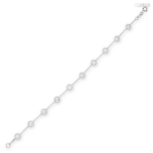 A DIAMOND BRACELET set with ten round cut diamonds