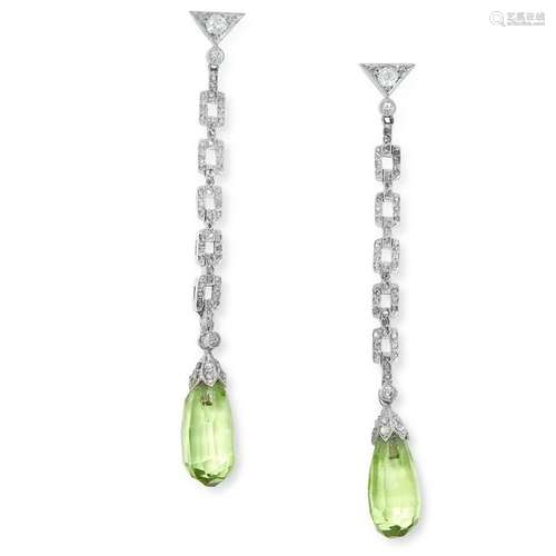 A PAIR OF ART DECO PERIDOT AND DIAMOND EARRINGS each