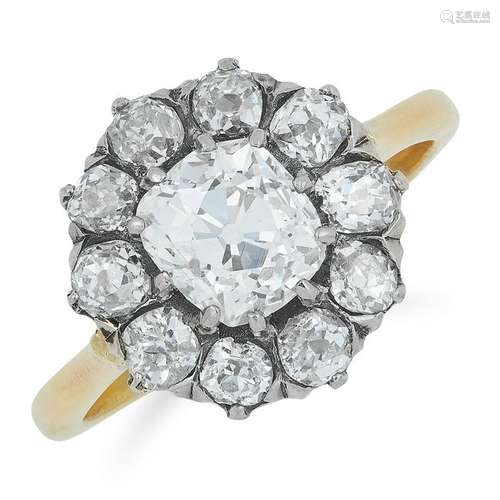 AN ANTIQUE DIAMOND CLUSTER RING set with a central old