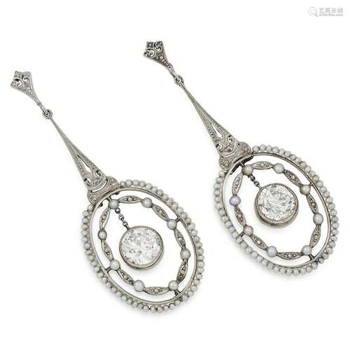 A PAIR OF EDWARDIAN DIAMOND AND SEED PEARL EARRINGS set