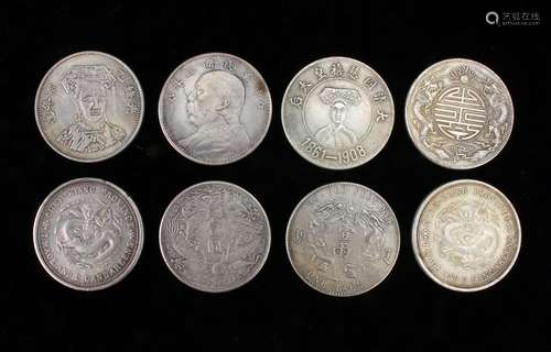 EIGHT CHINESE SILVER DOLLARS