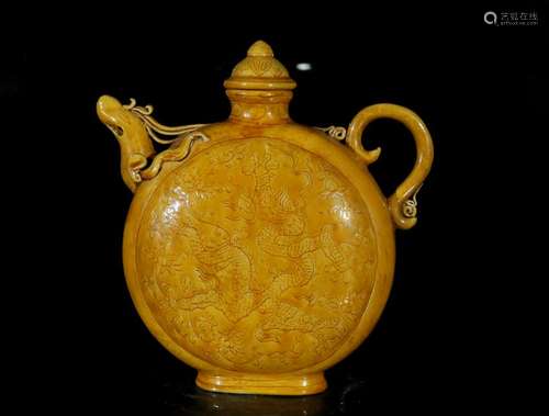 A yellow glaze 'dragon and phoenix' teapot