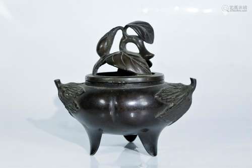 A bronze censer