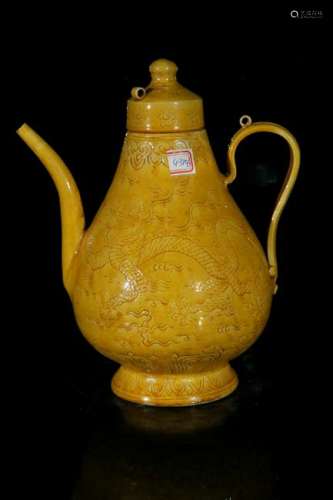 A yellow glaze 'dragon and phoenix' teapot