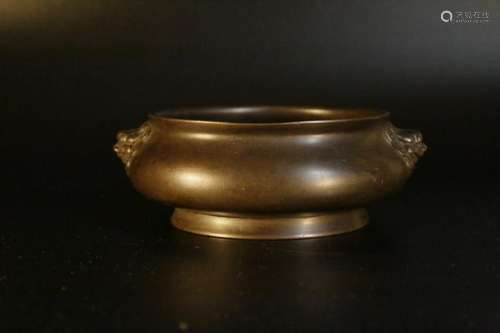 A bronze censer