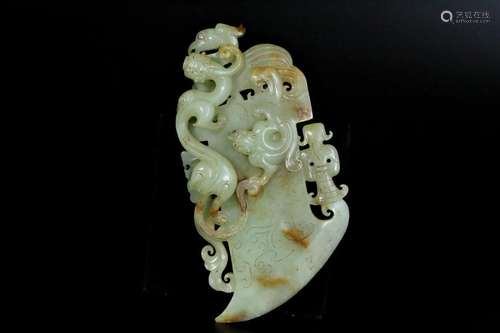 A white jade 'dragon and phoenix' pendant in shape of