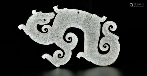 A white jade 'dragon' pendant