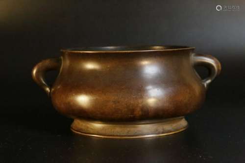 A bronze censer