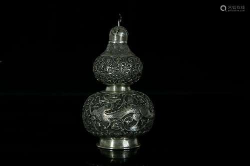 A sliver carved 'dragon and phoenix' bottle gourd