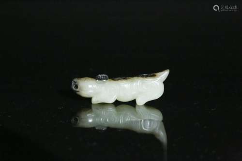 A white jade 'pig' pendant