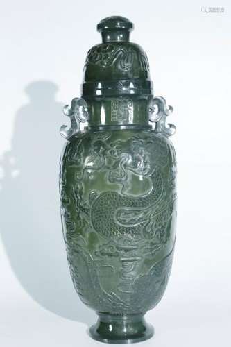 A gray jade 'dragons' bottle