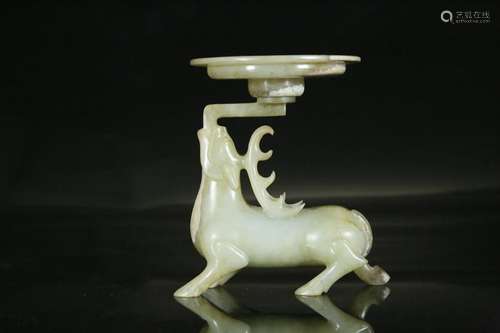 A white jade âdeerâ candlestick